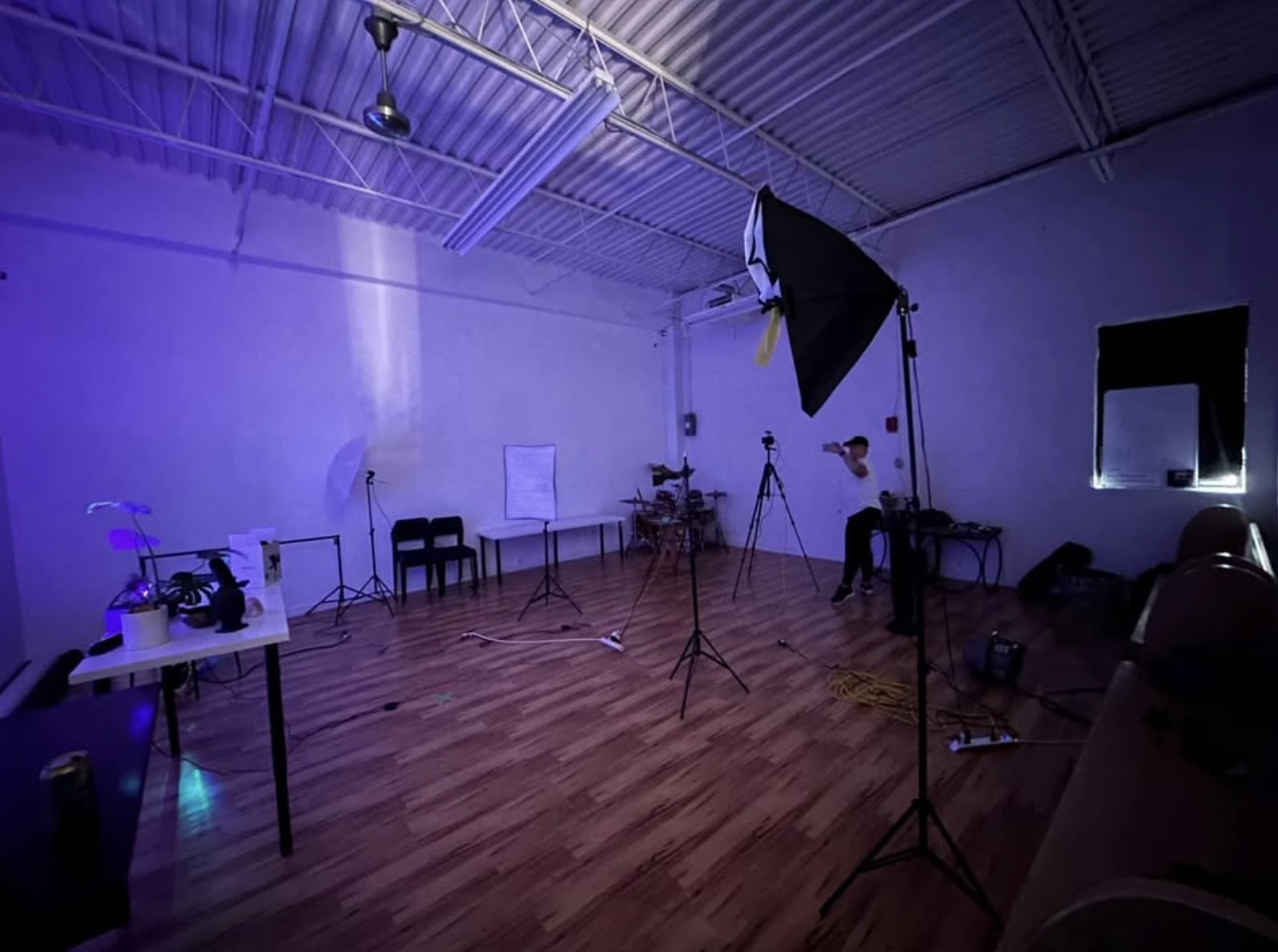Media Factory Group studio — production session with atmospheric purple lighting